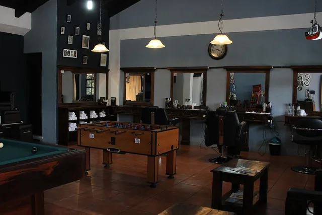 room, furniture, inside, chair, barber shop, pattern, perspective, architecture, lighting, lights, mirrors, barber, billiards, barber shop, barber shop, barber shop, barber shop, barber shop. Calgary chair turnover and what oilpatch hiring does to weekday demand
